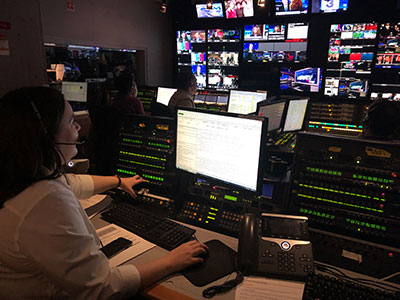 Colleen King in control room