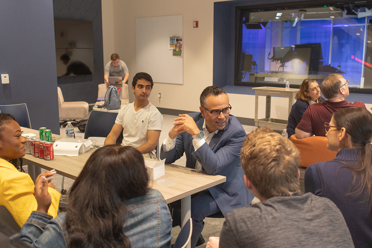 Holguin at Frank Center student workshop in Frank Newsroom