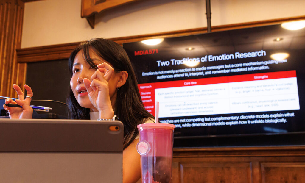 PhD student presenting in an ICR class