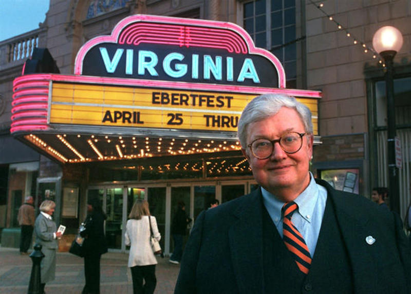 Roger Ebert in front of Ebertfest marquee