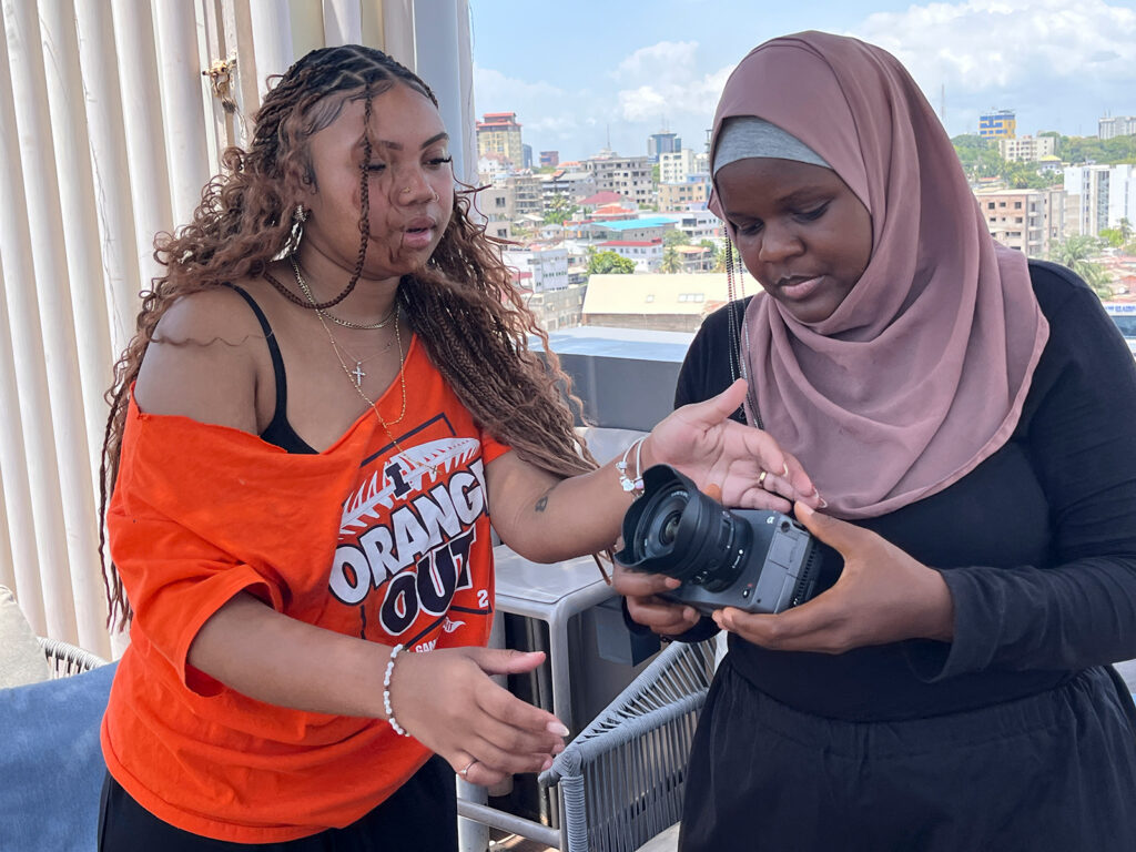 Students with camera in Ghana